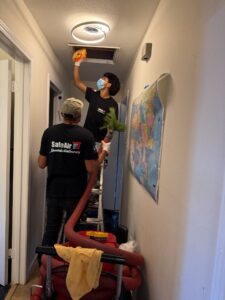 Air duct cleaning performed with a Roto brush inside a house in Mckinney, Texas, improving air quality and HVAC efficiency.