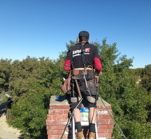 Chimney inspection for a red brick chimney in Arlington, TX, ensuring safety, efficiency, and structural integrity for homeowners.