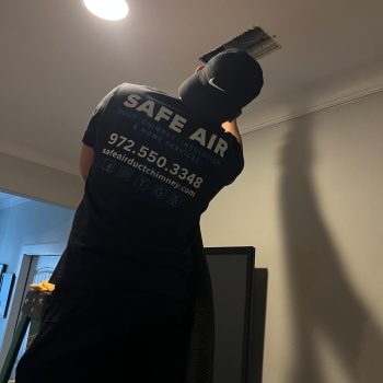 SafeAir technician cleaning air duct in a residential home in Allen Texas