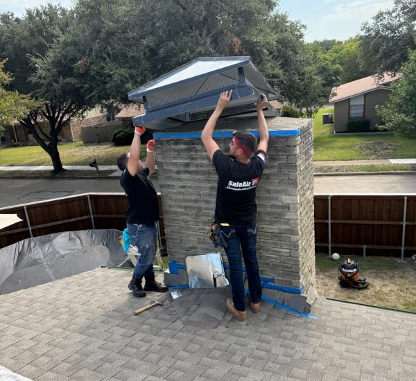 Custom chimney cap installation in McKinney, Texas, to protect against debris and weather.