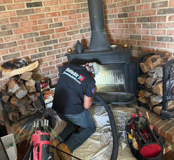 Fireplace cleaning service in Lewisville, Texas, ensuring a clean and efficient fireplace.