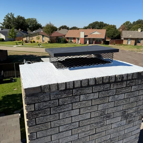 Chimney with a custom cap in Frisco, Texas, ensuring protection and efficiency.