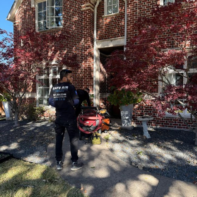 Chimney inspection for a red brick house in Dallas-Fort Worth, ensuring safety and efficiency.